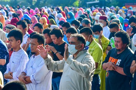 Filipino Muslims to mark Eid'l Fitr on April 22 .